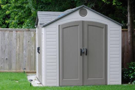 Prefabricated composite and recycled-content outdoor storage buildings retailers comparison: Sears vs Menard's