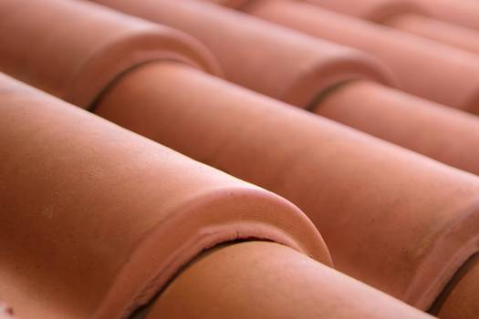 Traditional tile roofing vs composite roofing: pros, cons and prices