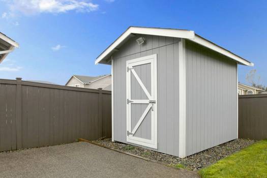 Prefabricated vinyl outdoor storage building comparisons: Lifetime Products vs Suncast