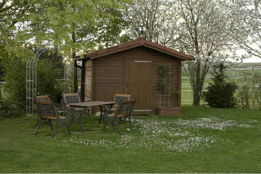 Prefabricated composite and recycled-content outdoor storage buildings retailers comparison: Costco vs Lowe's