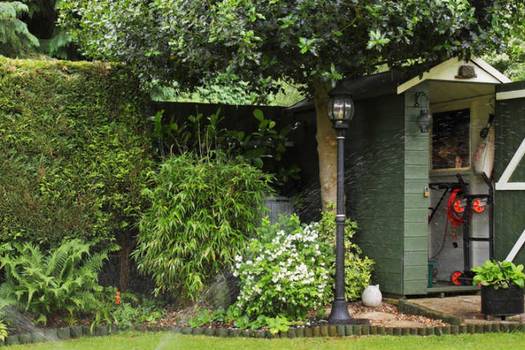 Prefabricated vinyl outdoor storage buildings retailers comparison: Costco vs Lowe's