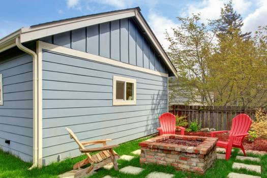 Prefabricated vinyl outdoor storage buildings retailers comparison: Lowe's vs Menard's