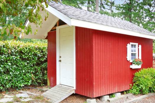 Prefabricated composite and recycled-content outdoor storage buildings retailers comparison: Home Depot vs Lowe's